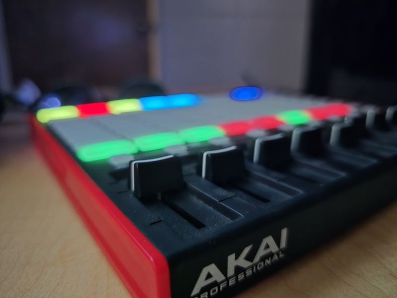 Akai APC mini controller with lit pads and faders