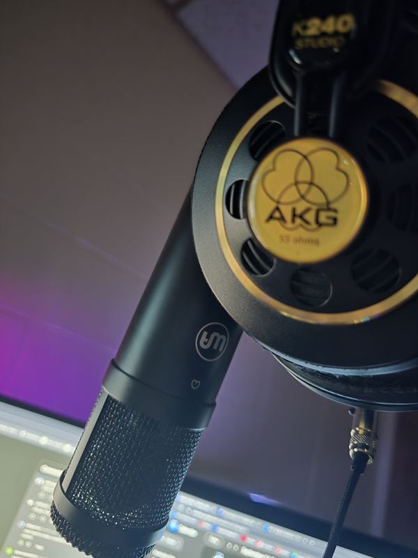 Studio microphone and headphones set up for a recording